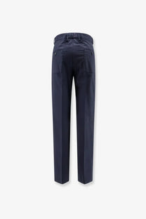 Aspesi women cotton trousers blue in dark navy with tailored fit straight leg and subtle back pleats shown from back side