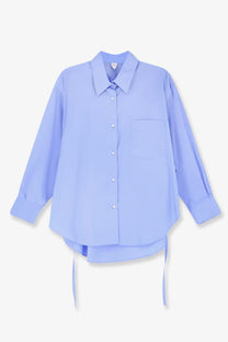 Aspesi women’s light blue oversized cotton button-down shirt with chest pocket and tie-side hem