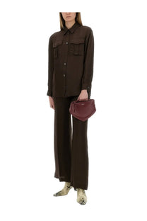 A sleek burgundy leather mini handbag with a structured silhouette paired with aspesi women’s brown pants mod0187
