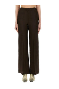 Aspesi women’s brown wide-leg trousers with smooth flowing fabric and elastic waistband front view