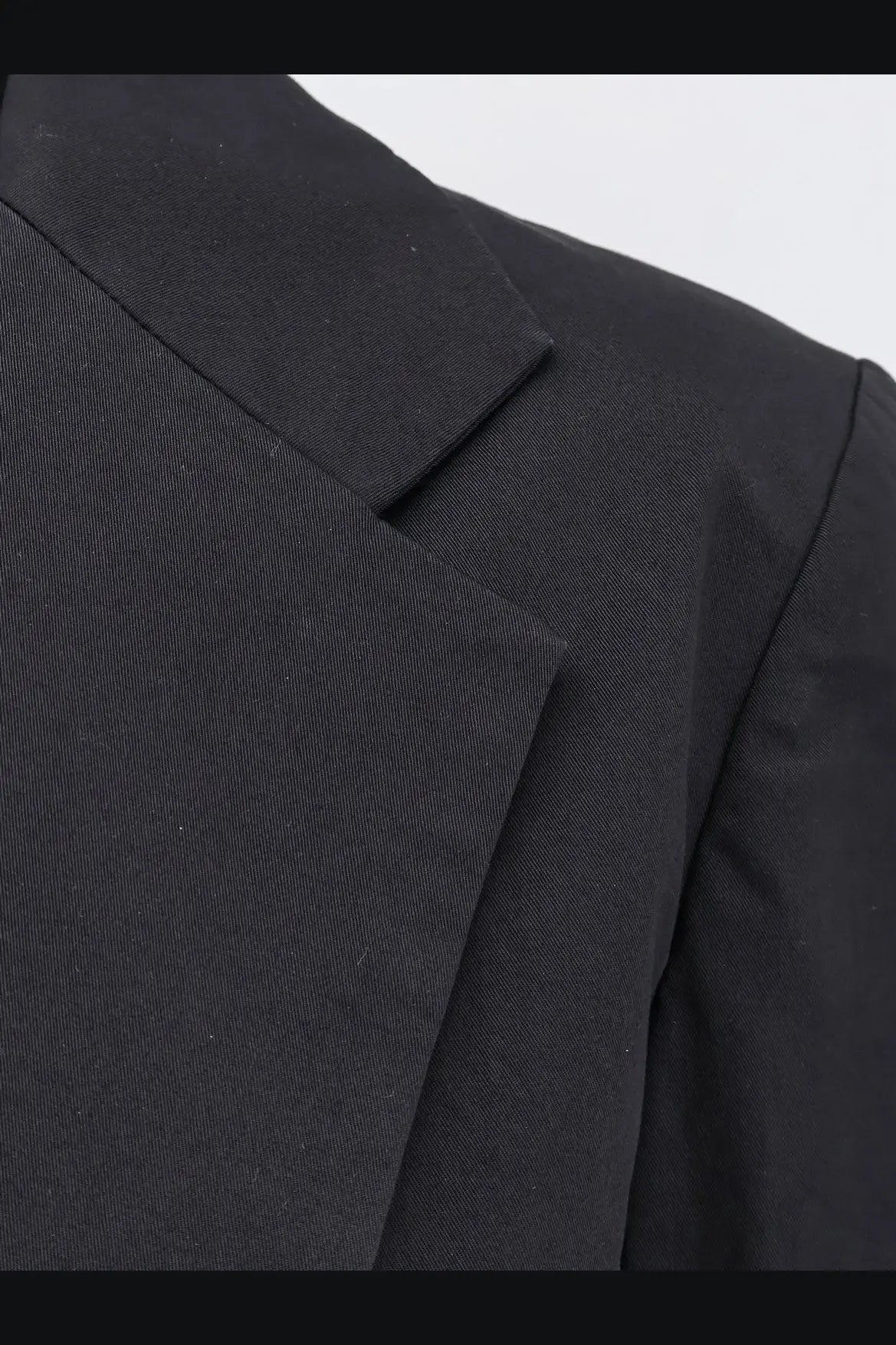Black aspesi women’s stretch cotton blazer with subtle textured weave and sharp structured lapel