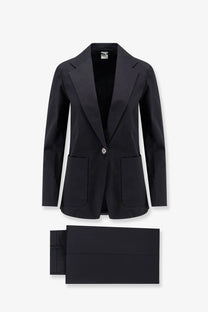 Aspesi women’s black stretch cotton tailored blazer with single button closure and flap pockets paired with trousers