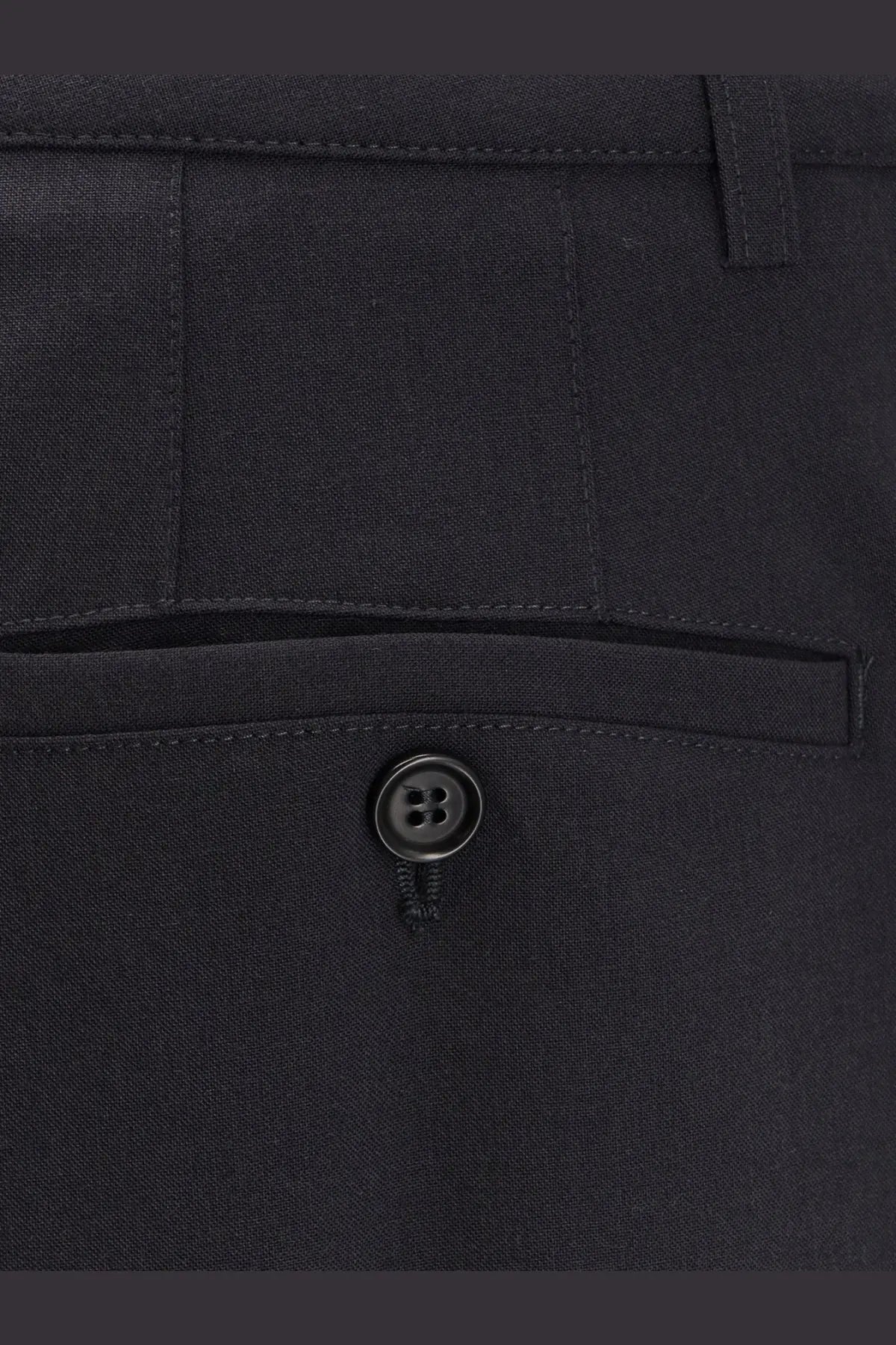 Black button detail on dark navy wool blend chino trousers from aspesi women’s collection