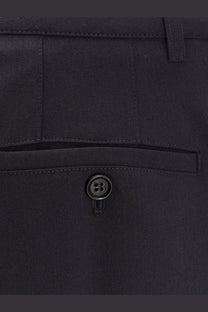 Black button detail on dark navy wool blend chino trousers from aspesi women’s collection