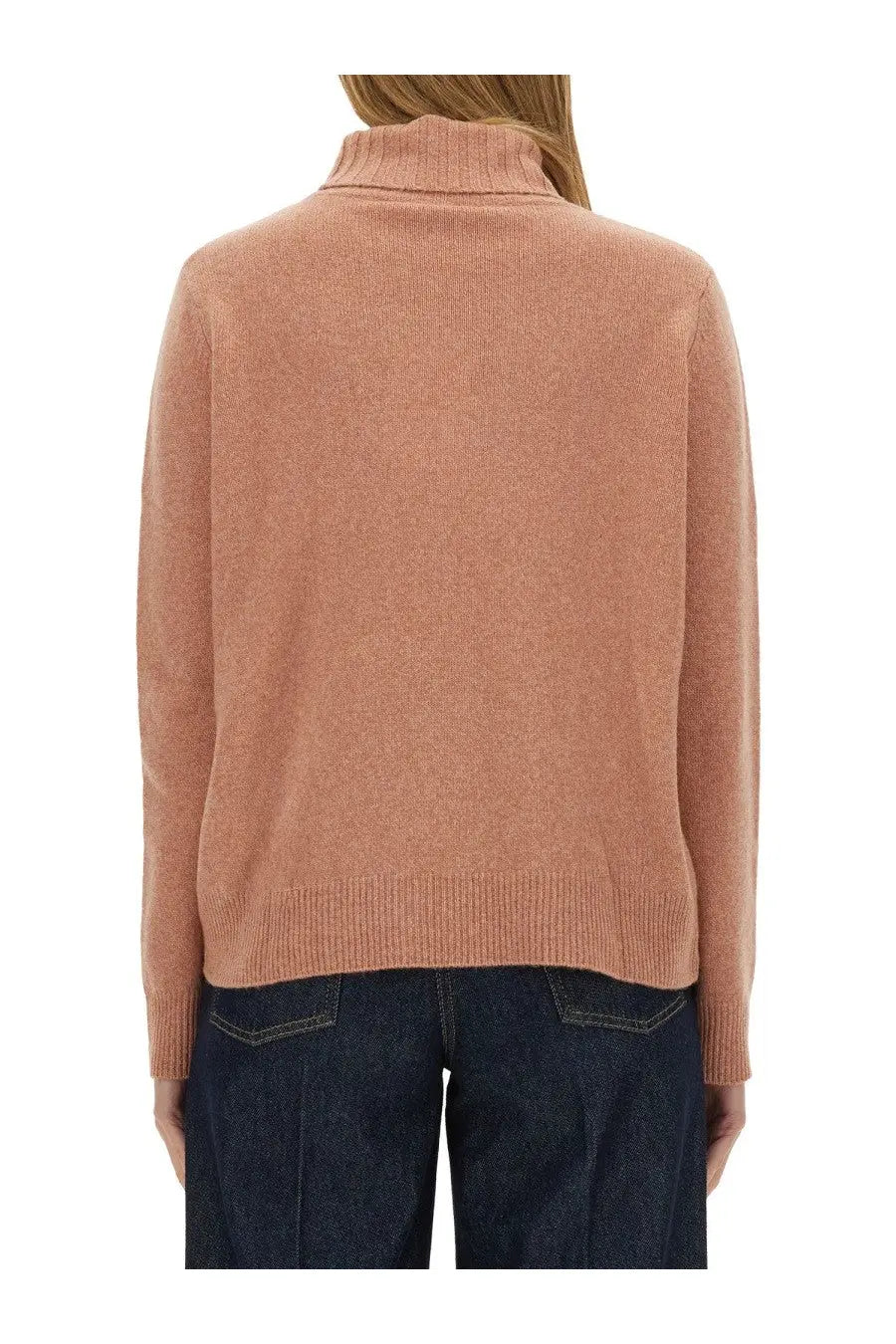A soft peach-colored long-sleeved wool jersey turtleneck sweater with ribbed hem and cuffs from ASPESI women’s collection