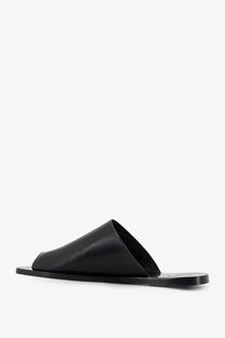 Black leather slide sandal with minimalist design and smooth finish from ATP Atelier womens rosa collection