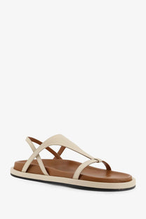 Beige leather strappy ATP Atelier women’s Ultimo sandal with brown insole and black rubber sole showing front side