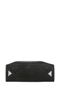 The Attico women’s bag the walk large black is a black textured leather tote with silver triangular corner accents