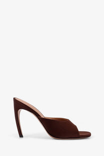 The Attico women’s Betta satin sandals brown feature a brown suede mule heel with a sleek sculpted stiletto design