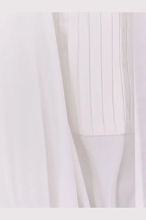 The attico women’s black white mini dress features white pleated fabric with vertical ridges and soft draping