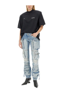 The Attico women’s cargo jeans blue are light-wash denim pants with multiple pockets and ruched tie-side cuffs