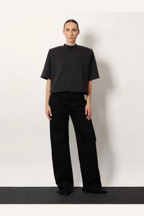 The Attico women’s cotton shirt in black features an oversized fit with short sleeves and a high neckline
