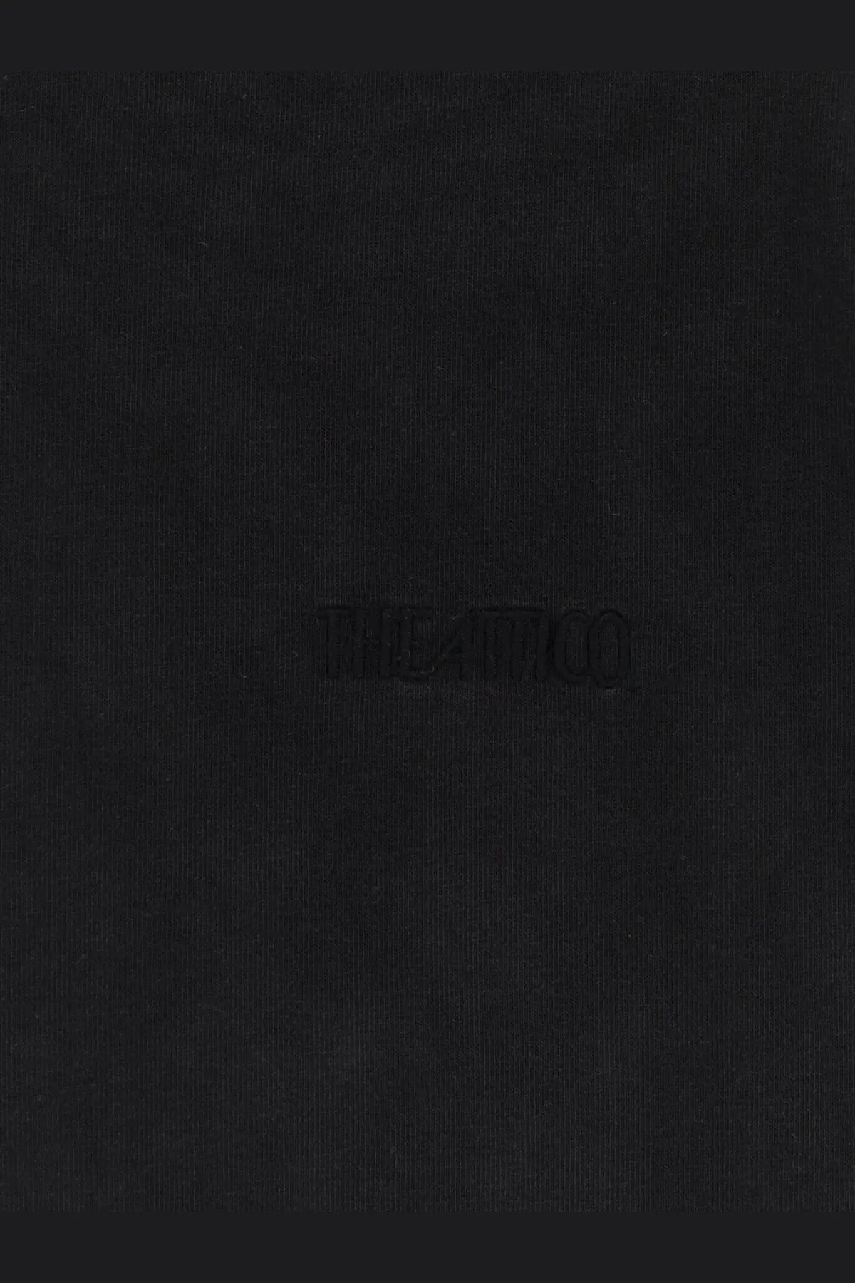 Black textured notebook with embossed title shown with the attico women’s cotton shirt black product