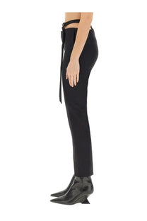 The attico women’s cut out black high-waisted trousers with a tied belt detail at the waist