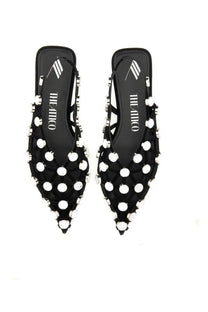 The Attico women’s dancer grid black mules with pointed toes feature white circular studs and a sleek modern design