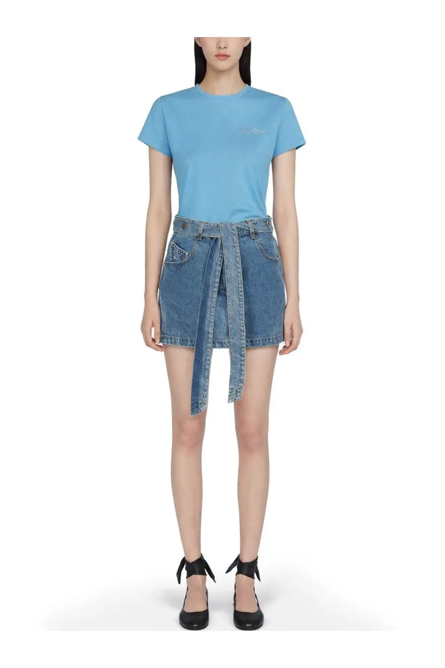 Light blue short-sleeved t-shirt with subtle embroidered logo paired with the attico women’s denim skirt blue