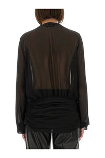The attico women’s black sheer georgette blouse with ruched waist and long sleeves in front view