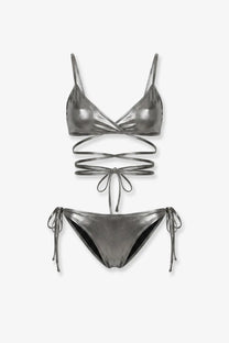 Shiny metallic silver two-piece lycra bikini set with crisscross straps and side ties by the attico