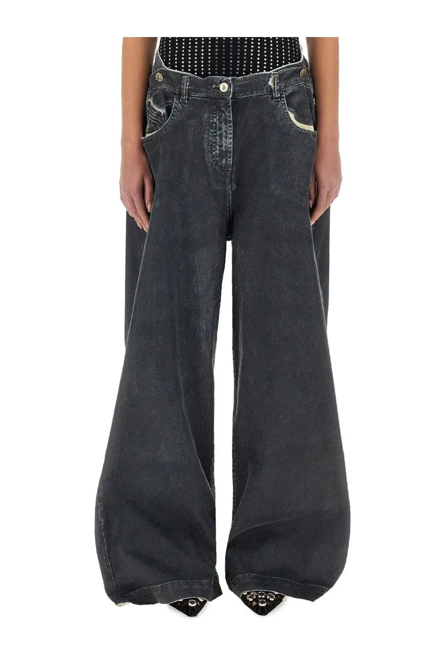Dark-wash denim wide-leg pants with subtle stitching and slight distressing in navy blue grey by the attico