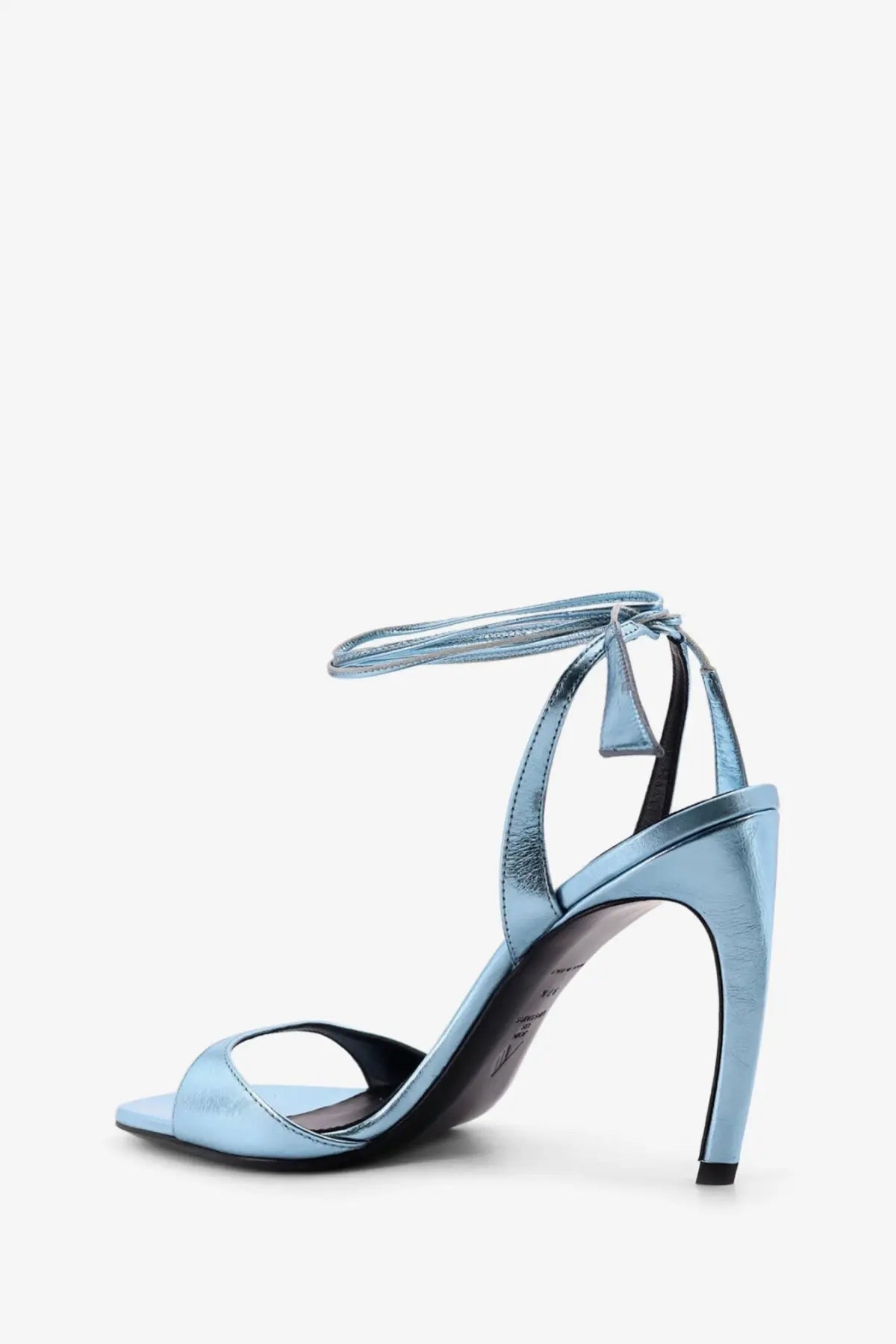 The attico women’s ora satin sandals are light blue metallic strappy high heels with a sleek modern design and ankle tie