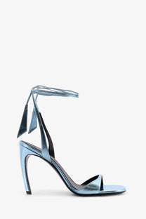 The Attico women’s ora satin sandals blue are sleek metallic blue strappy high-heeled sandals with sculpted heel and ankle ties
