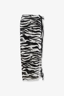 The attico women’s pareo cotton skirt in black features a sheer lightweight zebra-print sarong with side ties