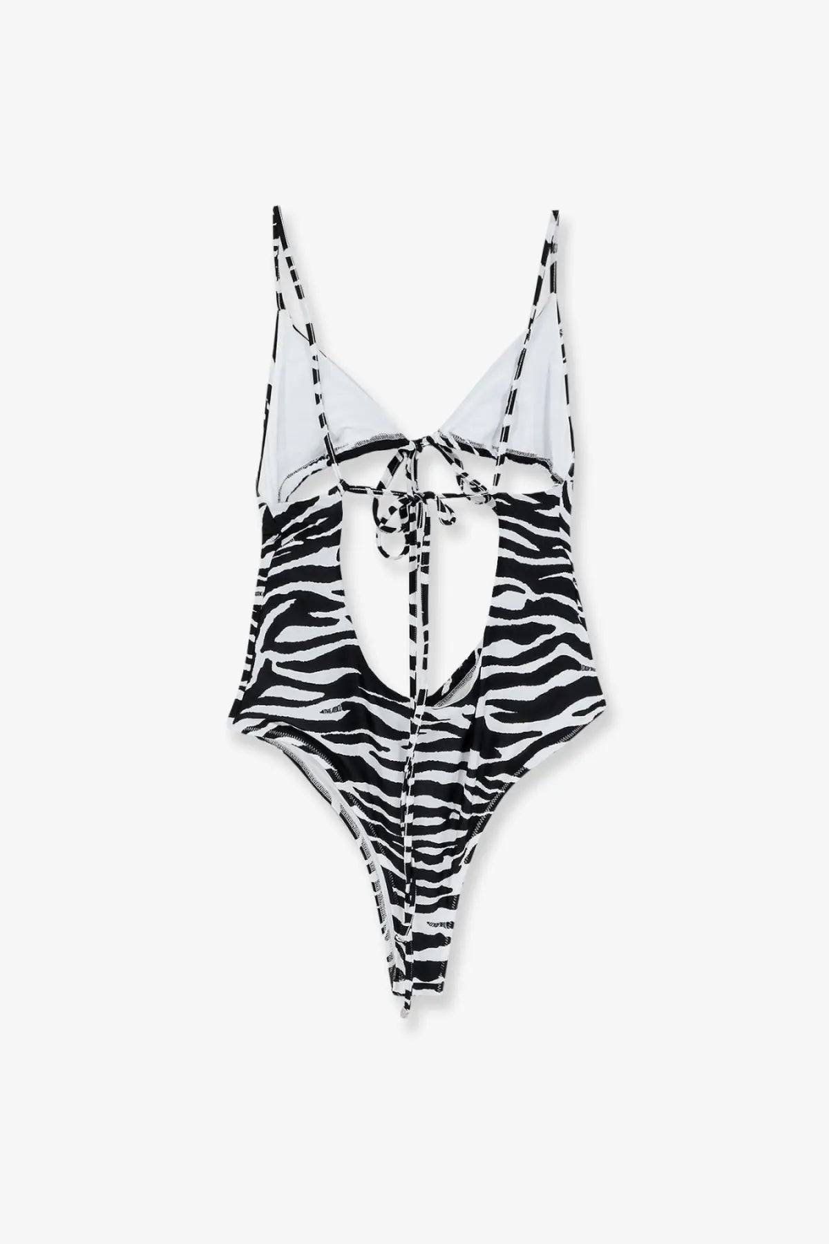 The Attico women’s black one-piece swimsuit with zebra stripes, thin straps, and a back tie detail shown from the back
