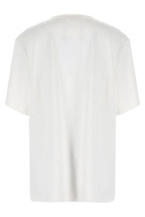 The Attico women’s white oversized short-sleeved shirt with a relaxed fit and subtle vertical creases