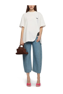 The attico women’s white oversized t-shirt features a small black logo on the chest and a relaxed fit