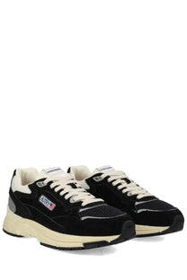 Autry men’s hyperway sneaker black with black and cream suede upper mesh panels and chunky rubber sole