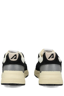 Back view of autry men’s hyperway sneaker black with cream and black leather and silver honeycomb heel panel