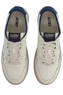 Autry men’s medalist low sneaker beige white leather with navy blue accents and perforated detailing