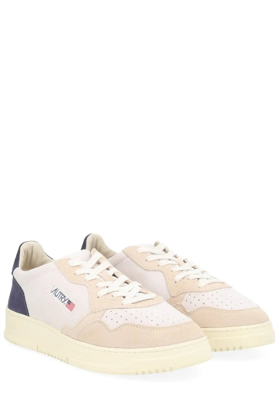 Autry men’s medalist low sneaker in beige and navy suede with white laces and cream rubber sole featuring aurry logo