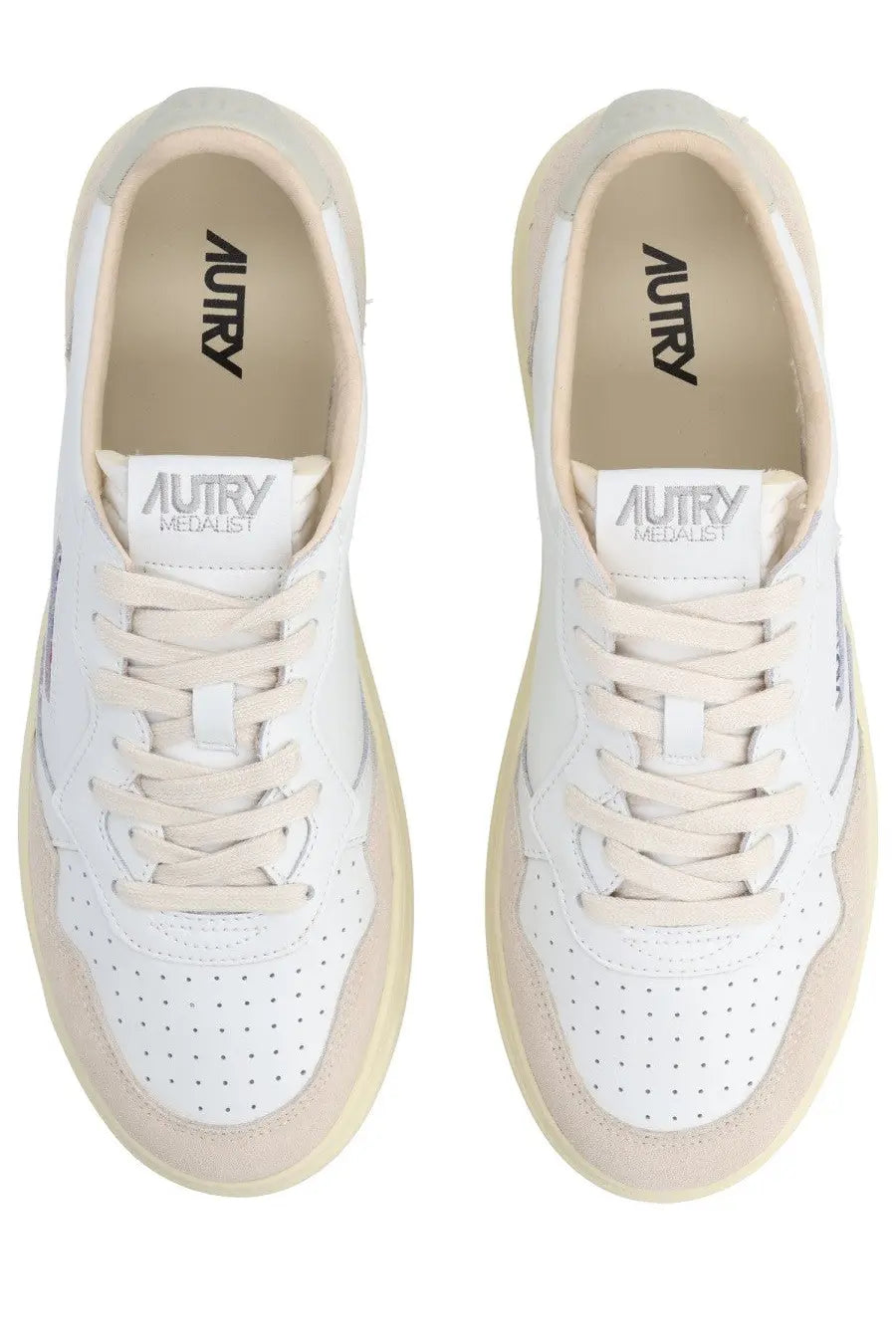 Autry men’s Medalist low sneaker in white and beige with perforated leather uppers and rubber soles