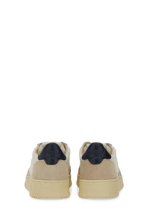Autry men’s medalist low sneaker in beige and black with a chunky sole for casual wear