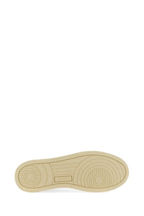 Beige rubber sole with circular tread patterns and subtle brand logo on autry men’s medalist low sneaker white