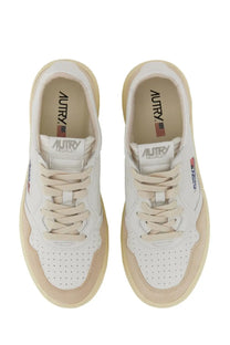 Autry men’s medalist low sneaker in white and beige with perforated leather uppers and suede accents