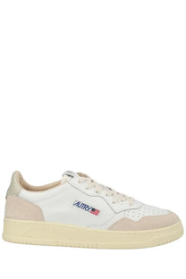 Autry men’s medalist low sneaker in white with beige suede toe cap perforated leather upper and american flag logo
