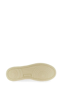 Cream-colored rubber sole with circular tread and embossed brand logo on autry men’s medalist low sneaker white heel