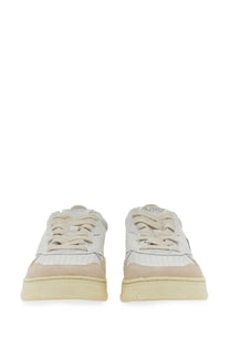 Autry men’s medalist low sneaker in cream with white and beige suede upper and perforated toe box detailing