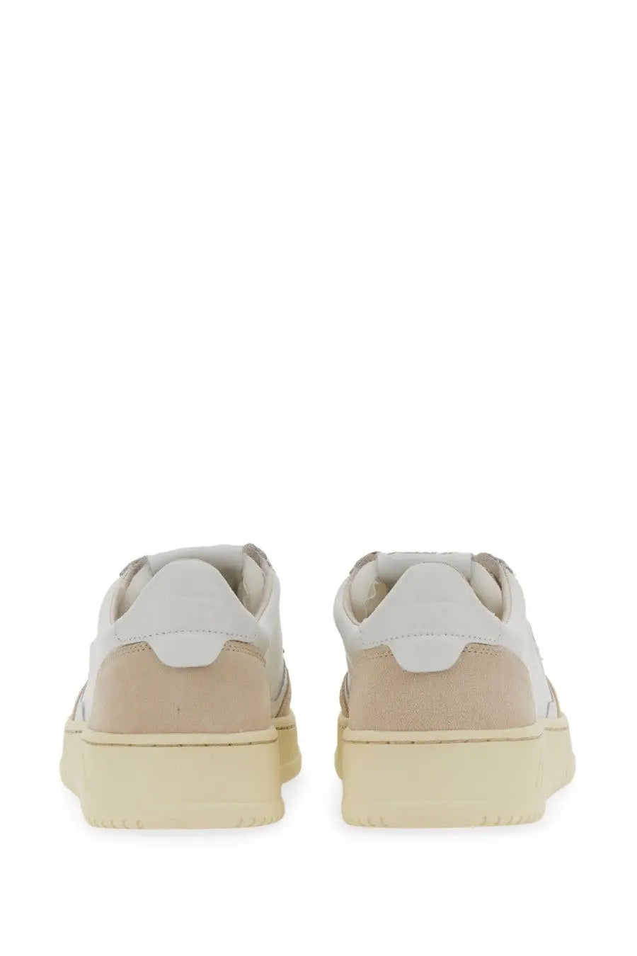 Autry men’s Medalist low sneaker in cream and white with suede upper rubber sole and classic athletic design