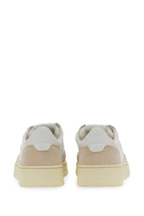 Autry men’s Medalist low sneaker in cream and white with suede upper rubber sole and classic athletic design