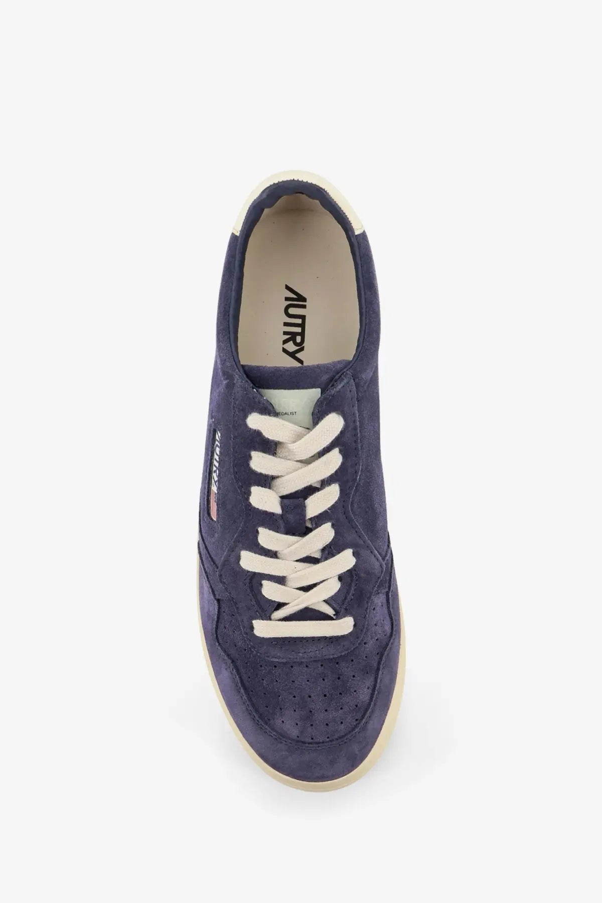 Navy blue suede sneaker with cream laces and matching sole from autry men’s medalist low white collection