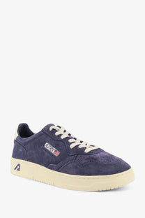 Autry men’s medalist low white navy blue suede sneaker with cream laces rubber sole and embroidered aurx logo on side