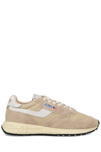 Autry men’s reelwind low sneakers in beige suede and canvas with white accents and mutry logo patch on the side