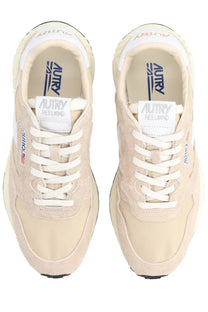 Autry men’s reelwind low sneakers in beige suede and mesh with white laces and retro design branding on the insole
