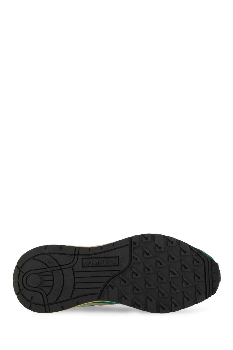 Black rubber sole with textured tread and adidas logo on the heel of autry men’s reelwind supervintage green sneaker back view