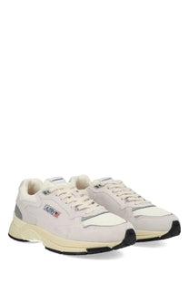 Autry men’s sneaker hyperway cream-colored suede and mesh with gray accents and black rubber soles featuring vurry logo