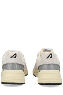 Back view of autry men’s sneaker hyperway multicolor in white and silver with honeycomb heel texture and black logo details