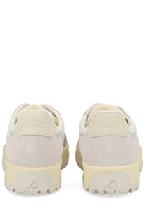 Autry men’s sneaker Wildpace low cream-colored suede with chunky rubber sole and subtle gray patterned accents